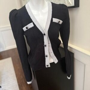 Black‎ and gray cardigan with a touch of whimsy